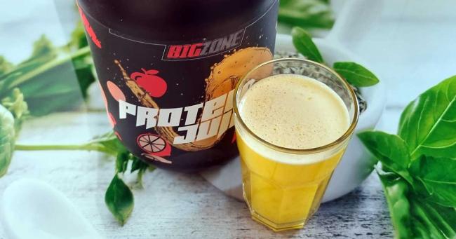 Bild zeigt Dose Big Zone Protein Juice und fertigen Shake